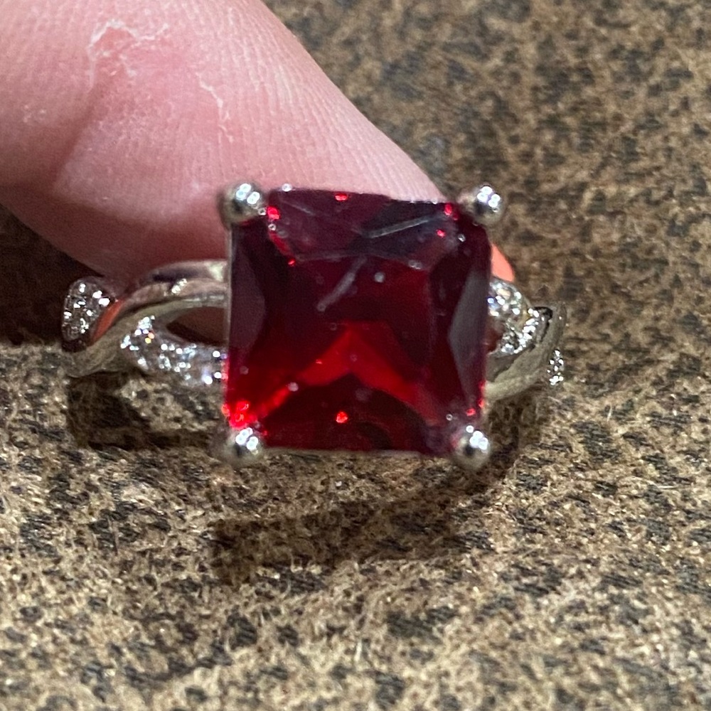 Ladies red square stone in silver, ring.